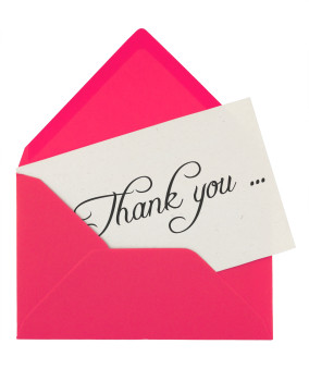 pink envelope with a thank you card isolated on white